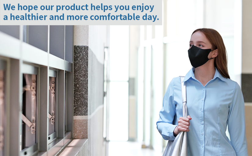 Young woman wearing black MAMISON KF94 mask while commuting indoors, lightweight ergonomic design providing daily protection, comfort, and a healthier lifestyle